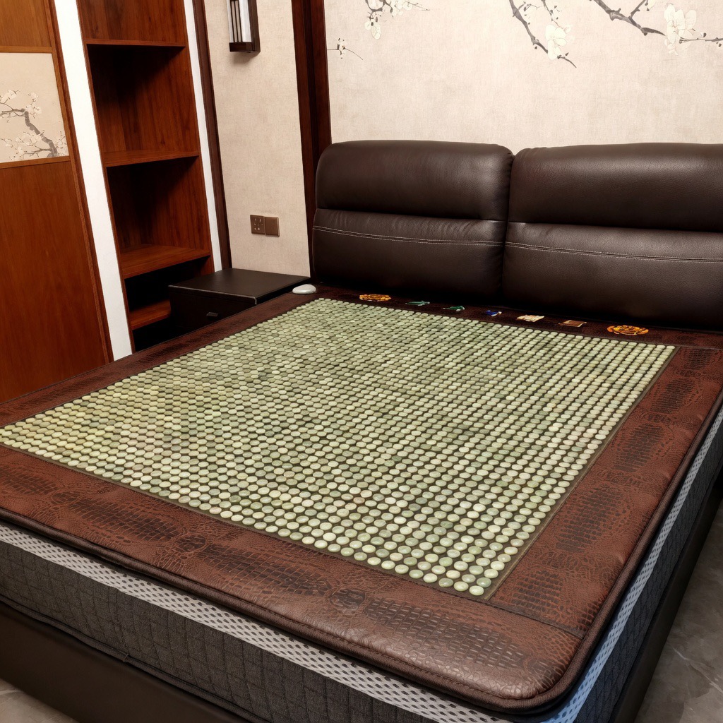 Person relaxing comfortably on the PEMF Tourmaline Therapy Mat in a cozy room setting